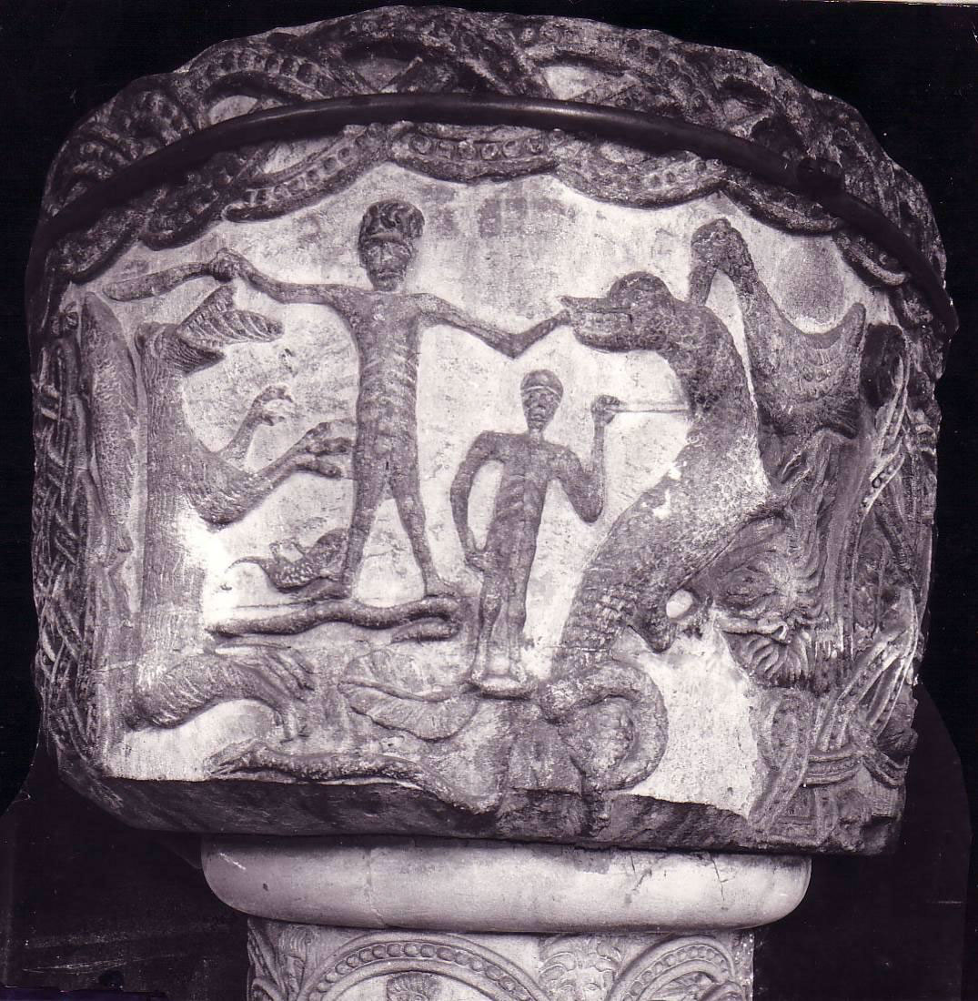 Carving on the font at Stone