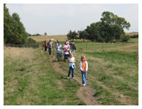 Visitors leaving the deserted medieval village at Quarrendon